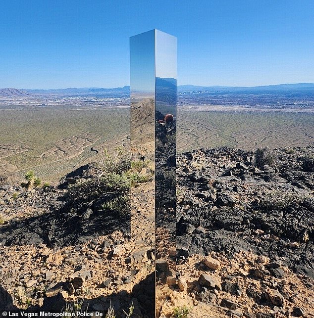 A mysterious metal monolith has appeared on a hiking trail near Las Vegas, leaving officials baffled as to how it got there