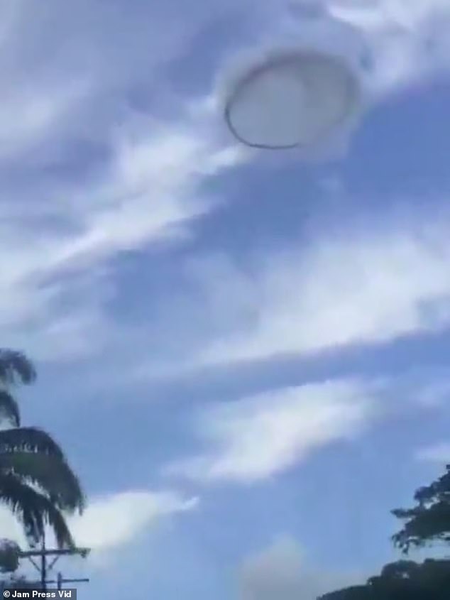 A bizarre, ring-shaped UFO that appeared in the skies over Venezuela was captured by some bewildered friends