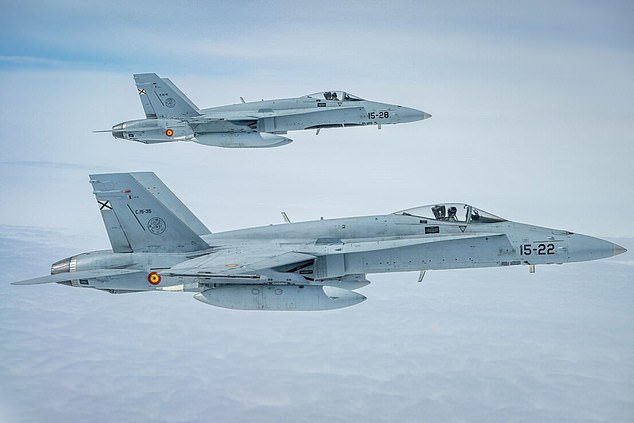 Spanish Air Force F-18 fighter jets are seen flying over the Baltic Sea to respond to a Russian aircraft