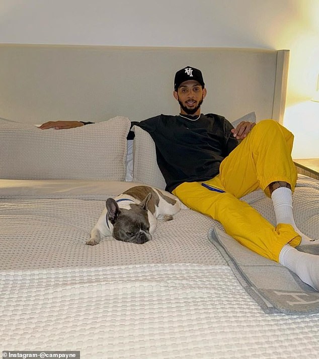 Payne, a nine-year NBA vet, is seen with his dog in an Instagram post from May 9