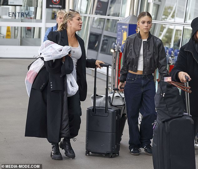 Natalie Bassingthwaighte looked effortlessly stylish on Friday as she was spotted strolling through Sydney Airport with her mini-me daughter Harper.  Both shown