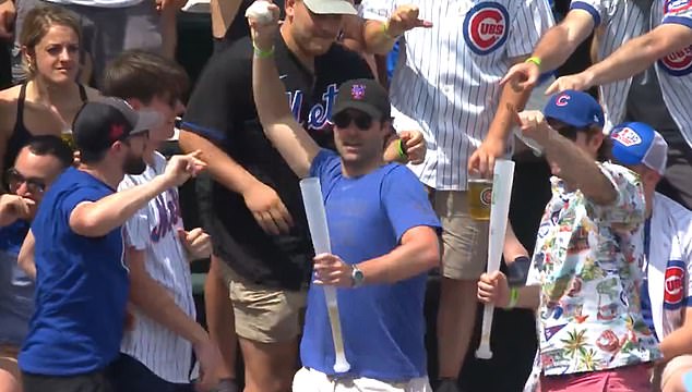 A New York Mets fan has been slammed for throwing a home run ball back at Wrigley Field