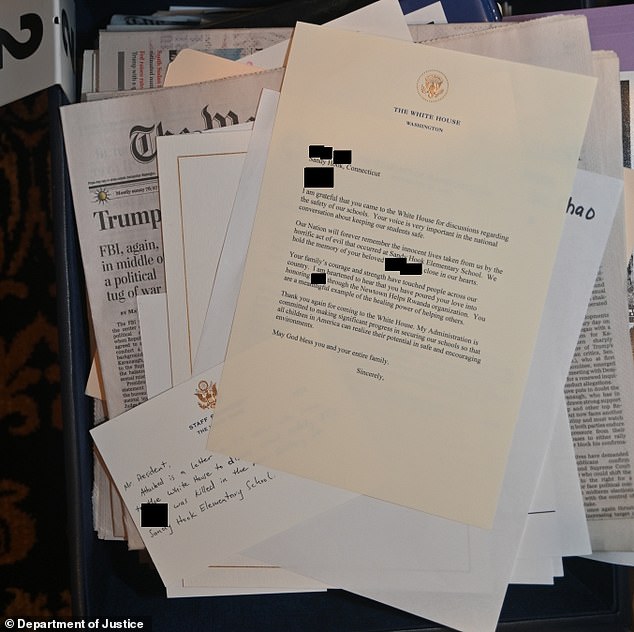 Among the documents was an apparently unsigned letter, on paper with the White House note, to the family of a child killed in the 2012 Sandy Hook elementary school massacre.