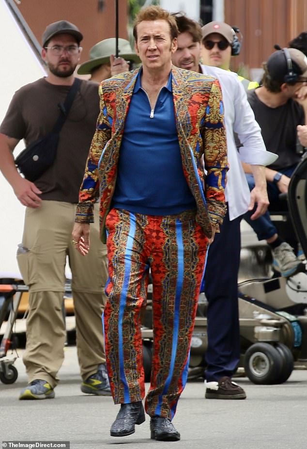 Nicolas Cage wore a multi-patterned suit while on a film set in Venice Beach, California, on Wednesday