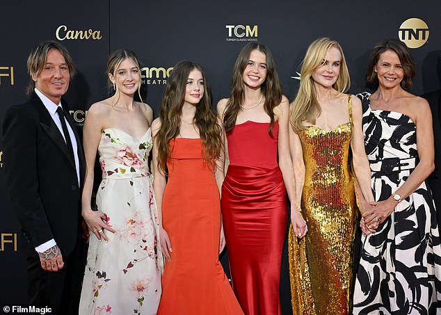 Nicole Kidman's teenage daughters are used to being around A-listers.  But Sunday Rose, 15, and Faith Margaret, 13, who the Australian actress shares with husband Keith Urban, have one star they 'fangirl' over.  Keith (from left) pictured with Sunday, Faith and Nicole