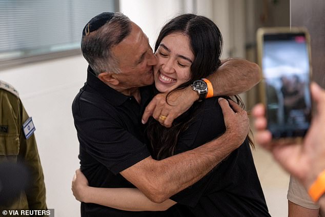 After 245 days of captivity, Argamani was rescued on Saturday during an IDF raid that also freed three male prisoners: Almog Meir Jan, 22, Andrey Kozlov, 27, and Shlomi Ziv, 41. She is seen here hugging her father after being reunited goods.  on Saturday