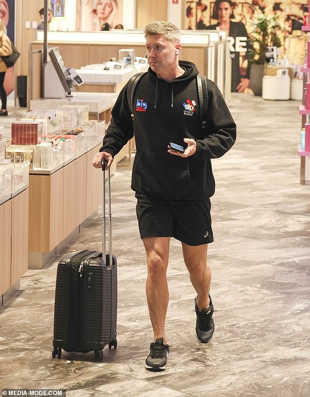 Michael Clarke (pictured) took off from Sydney Airport on Saturday, shortly before his new romance was 'confirmed'