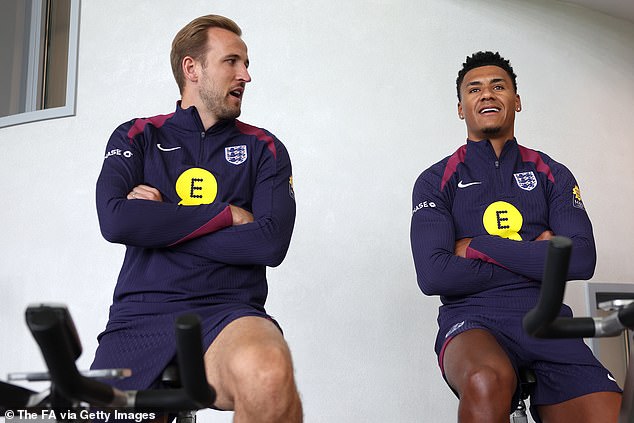 Ollie Watkins (R) says he could play up front with England captain Harry Kane (L) at the European Championship.