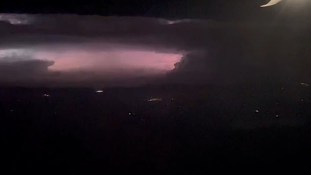 Dramatic footage apparently shared by someone aboard the Southwest Airlines flight, which passed over Oklahoma, shows a large thunderstorm in the sky on Wednesday