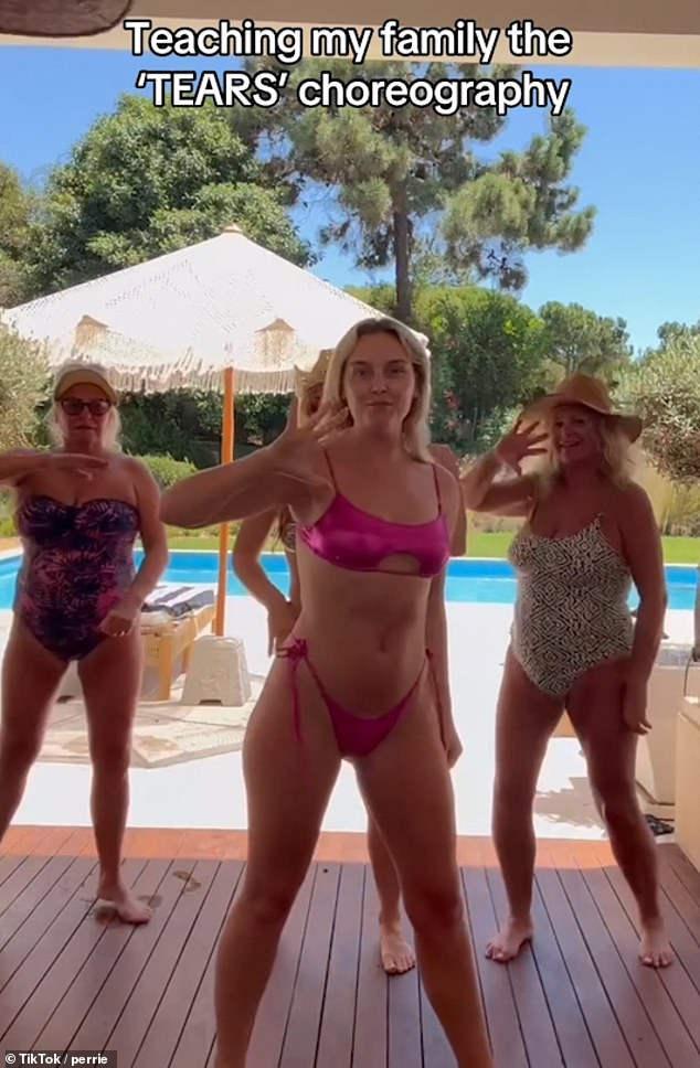 Perrie Edwards, 30, showed off her abs in a pink metallic bikini as she danced to her new song Tears in a TikTok video with her family on Thursday