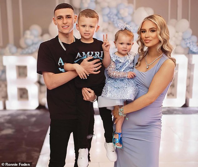 Foden and his girlfriend Rebecca Cooke announced in April that they are expecting their third child - pictured with son Ronnie, five, and daughter True, 12 months
