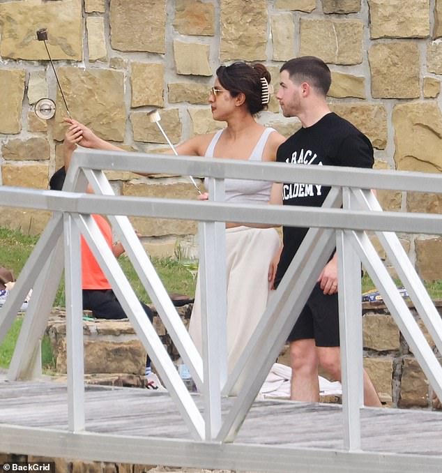 Priyanka Chopra and her husband Nick Jonas were spotted enjoying a relaxing evening at a friend's house on the Gold Coast on Saturday