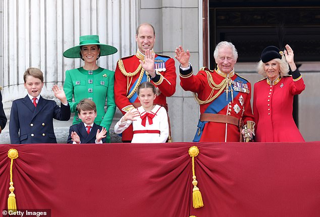 Prince William and Kate – who will not attend this year's traditional Trooping the Color rehearsal – wave alongside their children and King Charles and Queen Camilla at the event in June last year