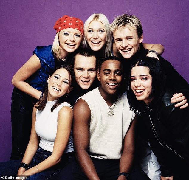 The mum-of-two also admitted she was 'consumed' by anxiety during the early years of S Club 7 (clockwise L-R Rachel, Hannah Spearritt, Jo O'Meara, Jon Lee, Tina Barrett, Bradley McIntosh and Paul Cattermole in 2000)