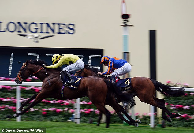 Rosallion holds off Henry Longfellow to win the St James's Palace Stakes at Royal Ascot