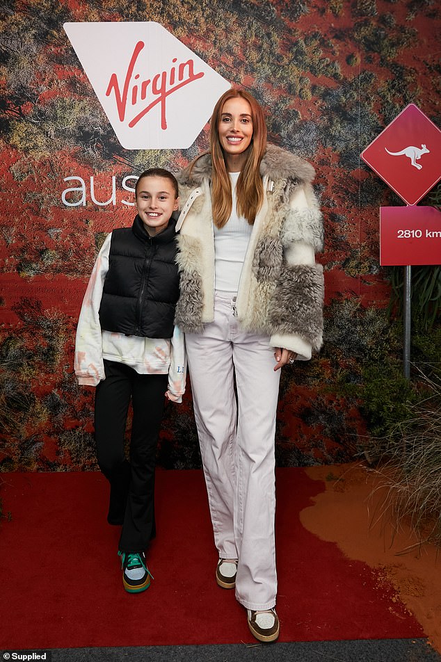 Speaking to Daily Mail Australia during a trip to celebrate Virgin Australia's launch event celebrating direct flights from Melbourne and Brisbane to Uluru, the model revealed she will soon announce an exciting new chapter in her career.  (Pictured with daughter Billie)