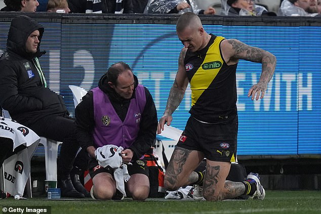 Richmond superstar Dustin Martin was forced out with a back injury on Sunday