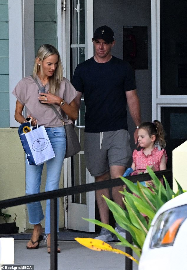 Rory McIlroy and Erica Stoll put on a united front while out and about with their daughter Poppy