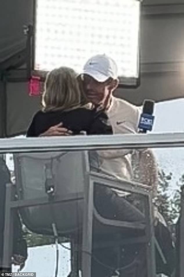 Rory McIlroy was pictured hugging CBS journalist Amanda Balionis after their TV interview