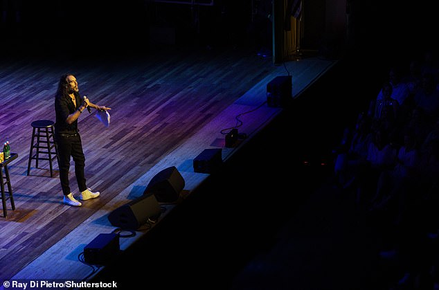 Russell Brand, 48, pictured performing at a fundraiser for Robert F. Kennedy Jr.'s presidential campaign.  last month