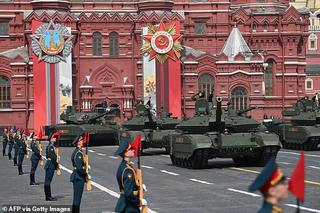 Russian T-90M and T-14 Armata tanks parade through Red Square during the dress rehearsal of the Victory Day military parade in central Moscow on May 7, 2022