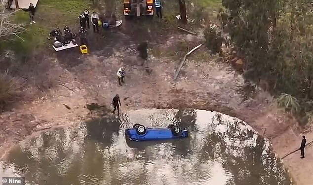 The blue Mitsubishi Lancer hatchback ended up on its roof, submerged in a body of water, after going off the road in the Sawyers Valley on Wednesday evening
