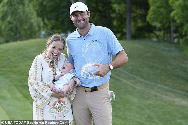 Scheffler toasts the victory at Muirfield Village with his wife Meredith and newborn son Bennett