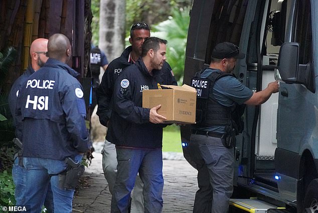 Federal agents dramatically raided his homes in Miami, Florida, and Los Angeles, California, on March 25 as part of a sex trafficking investigation (pictured).  Diddy's lawyer claimed that the music producer was the victim of a witch hunt