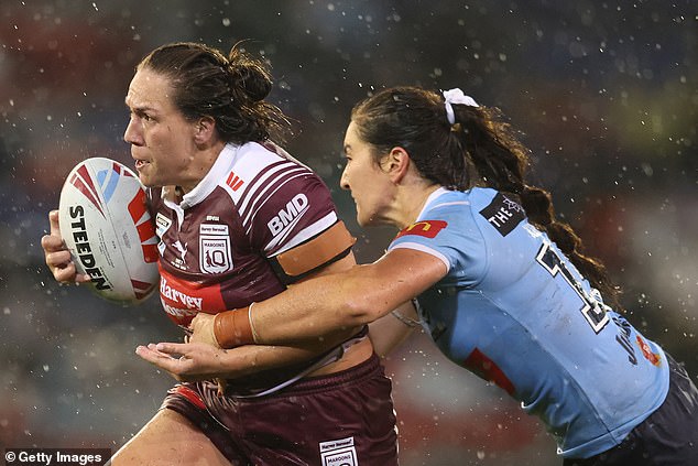 New South Wales are the favorites to win this week's decider in Women's State of Origin (pictured as Queensland's Evania Pelite is tackled in game two this year)