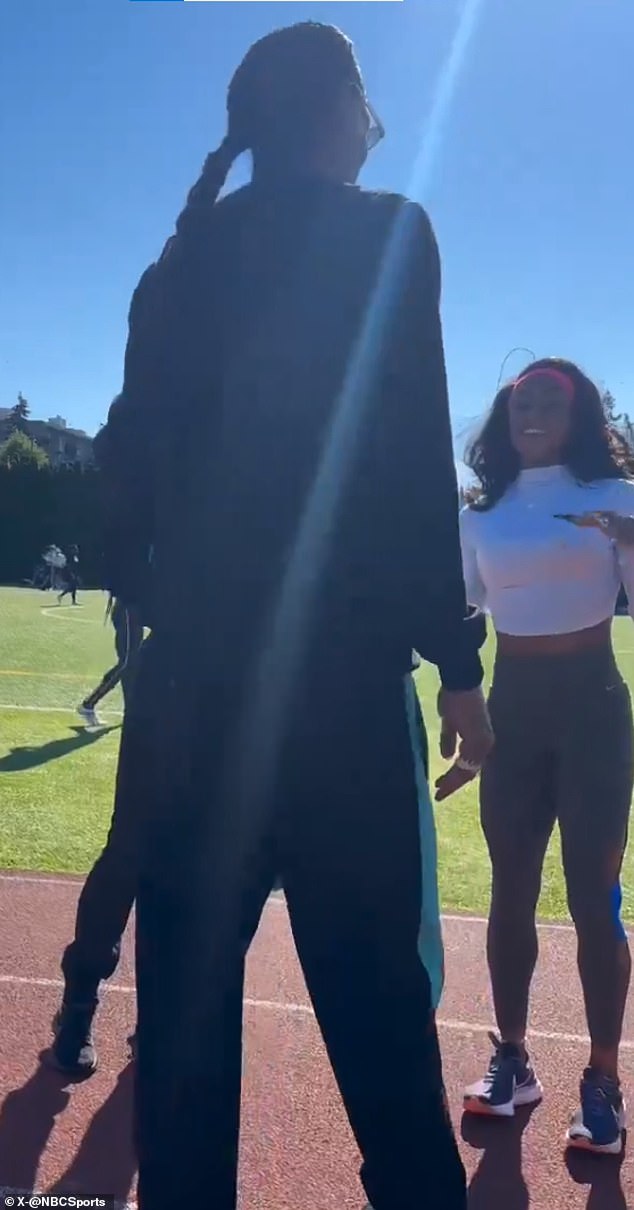 Richardson looked impressed as she met Snoop Dogg before her race in Eugene, Oregon