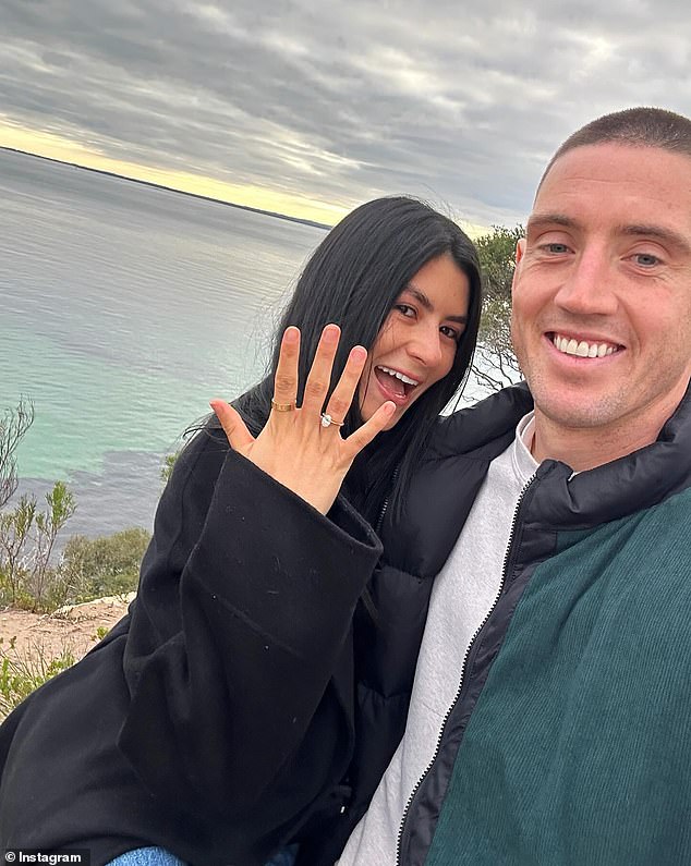 AFL star Darcy Cameron is engaged to her long-time girlfriend Adriana Guevara.  Both shown