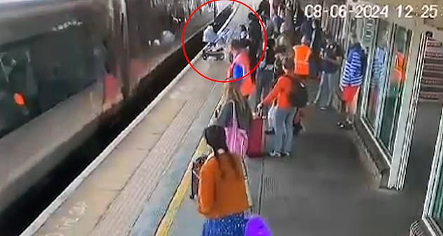 Bystanders said the baby's mother and grandmother were both distraught after the stroller rolled over the station's yellow line and crashed into the side of the train.