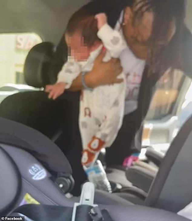 A one-month-old baby wearing a long-sleeved romper was pulled from the backseat of the hot car