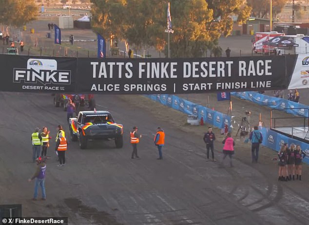 Six spectators watching the annual Finke Desert Race (pictured) in the Northern Territory on Saturday were injured after a mysterious explosion