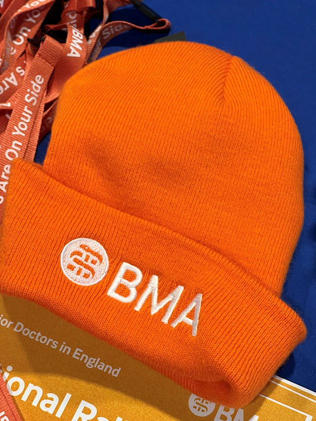 Many high-profile medics are dressed in bright orange clothing with the British Medical Association logo as they push for a 35 percent pay rise and better working conditions
