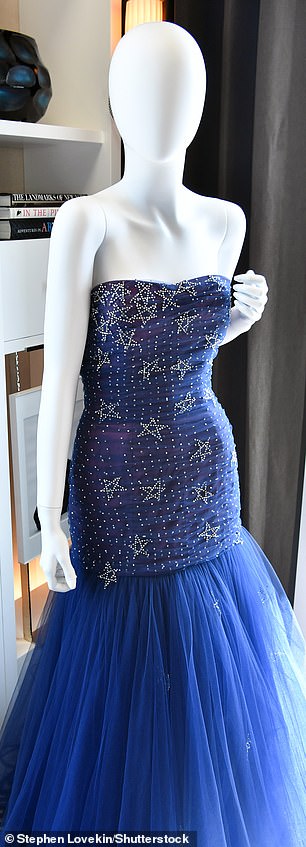 One of Diana's most valuable timeless pieces available for purchase is her midnight blue tulle dress from Murray Arbeid, adorned with sparkling diamond stars.  The dress is estimated to sell for $200,000.