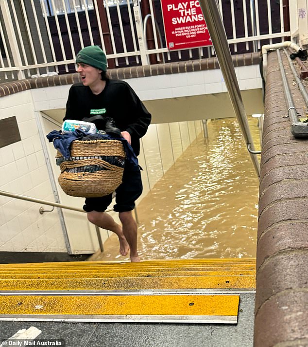 Sydney's Lewisham train station was closed for more than an hour on Saturday as heavy rain drenched the city