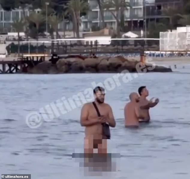 Boozy Brits were back on their feet in Magaluf last night - as they ignored the party resort's new stricter measures against public drinking and dived naked in the sea (pictured)