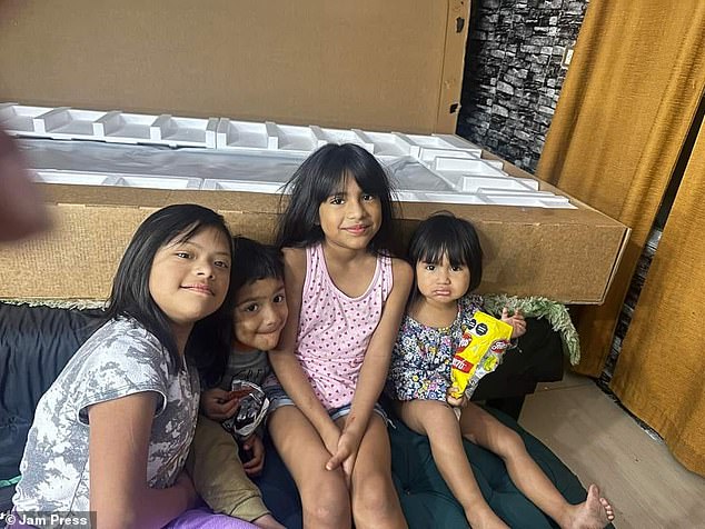 Victoria Santiago, two (right), Josué Santiago, four (center left), Yamilet Santiago, eight (left), and Josira Santiago, 11 (center right), were unable to leave the house when an electrical fire broke out