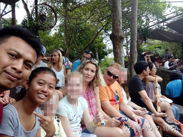 Samantha Murphy clutches her phone in the eye-catching case during a trip to Bali in 2017