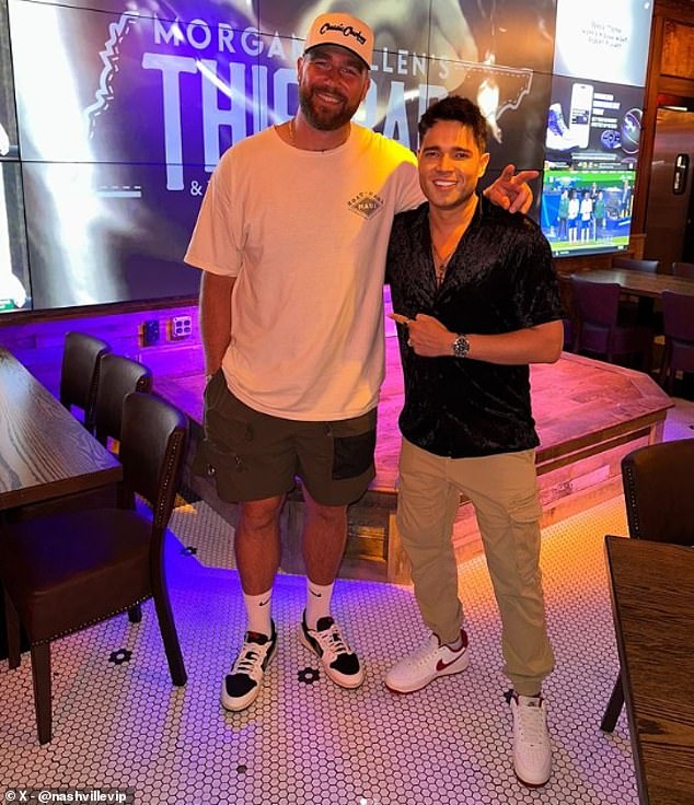 Fabiano Santos (right), who handles relations for the restaurant, is pictured with Kelce