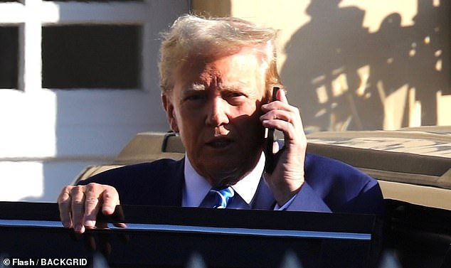 Former President Donald Trump waved to his supporters while talking on the phone as he left his Beverly Hills estate for a fundraiser.