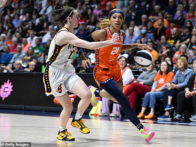 DiJonnai Carrington (21) subtweeted Caitlin Clark (L) for her response to a question about the use of her name in an ongoing 'culture war' surrounding the WNBA in recent weeks