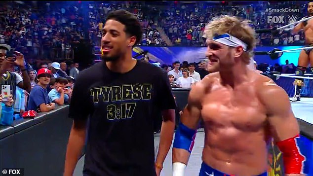 Tyrese Haliburton and Logan Paul walk past Jalen Brunson before a WWE match at MSG