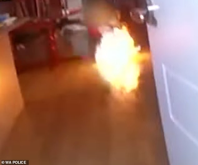 A police body-worn camera captured the moment a 30-year-old man allegedly set fire to a house while a woman and three young children were inside