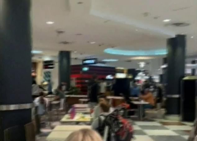 Shoppers at Adelaide's Westfield Marion filmed a fight between two groups of teenagers that left the mall locked down at 2.53pm on Sunday.