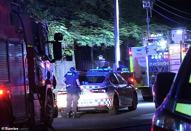 Emergency services rushed to Cypress Street in Woodridge, south Brisbane, about 6pm on Sunday after reports a two-storey house was on fire (pictured)