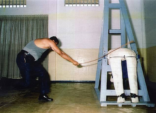 If convicted, he could receive twelve lashes. Pictured is a prison officer at Singapore's Changi Prison demonstrating the beating of a mannequin