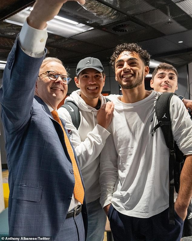 Mr Albanese posted a photo of himself posing with three university students to remind Australians that his government plans to wipe out more than $3 billion in HECS debt.