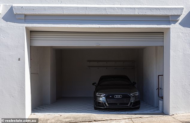 The locked garage (pictured) in Woollahra, in Sydney's eastern suburbs, sold for a whopping $500,000 so the buyer (a local resident) could house his electric vehicle